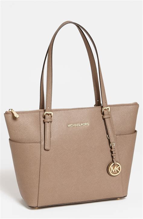 michael kors tasche leoprint|Michael Kors leather tote.